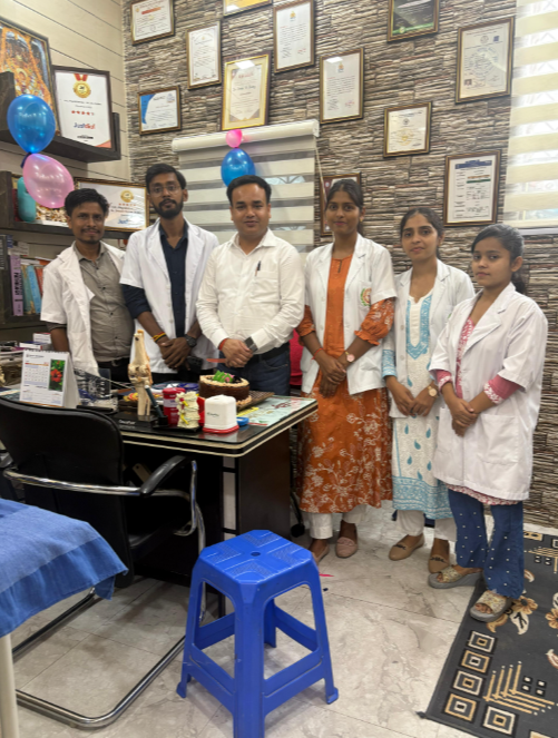 Dr. D.K. Dubey with the physiotherapy team